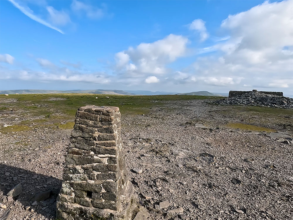 Looking towards Whernside and the weather shelter from the trig point on Ingleborough's summit