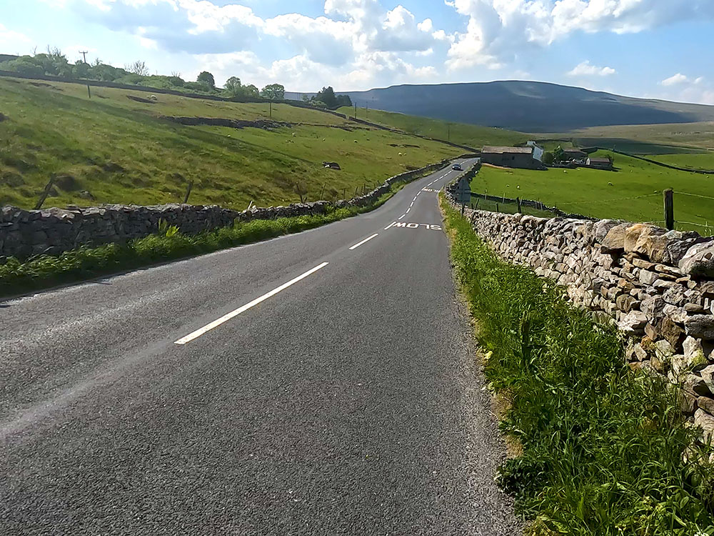 Heading along the road towards Ribblehead and Whernside on the Yorkshire 3 Peaks Walk