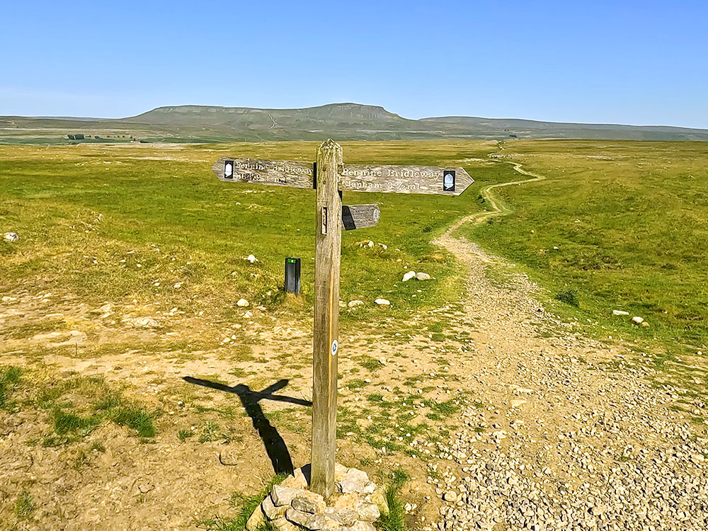 Keep staright ahead at the signpost