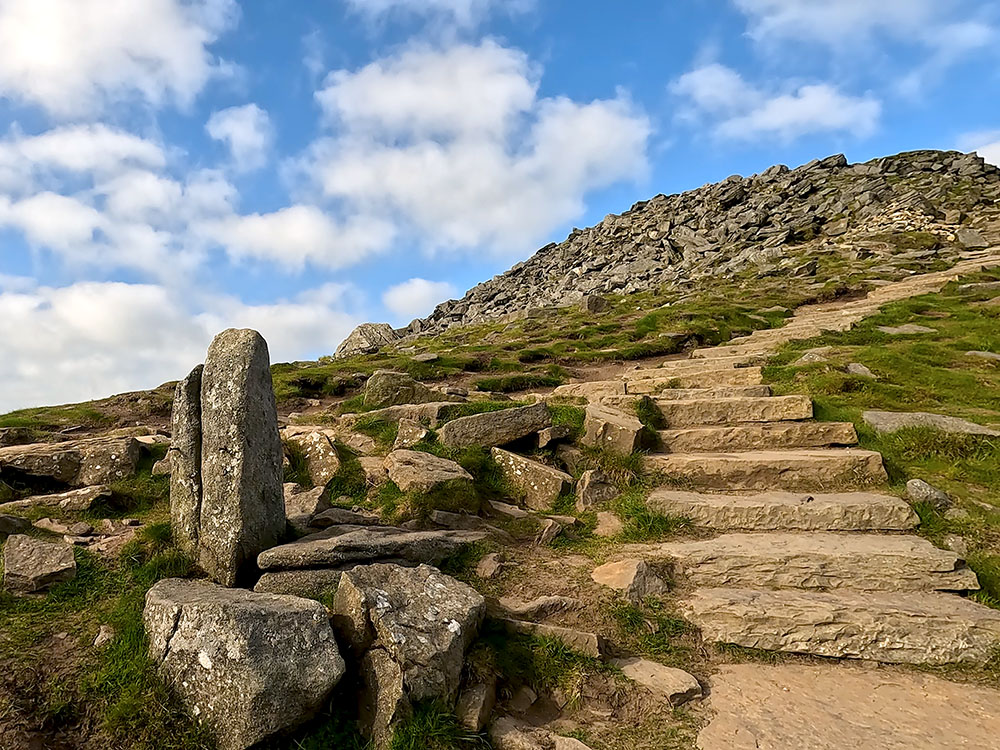 Stone waymarker, marking where the path splits on the way back down