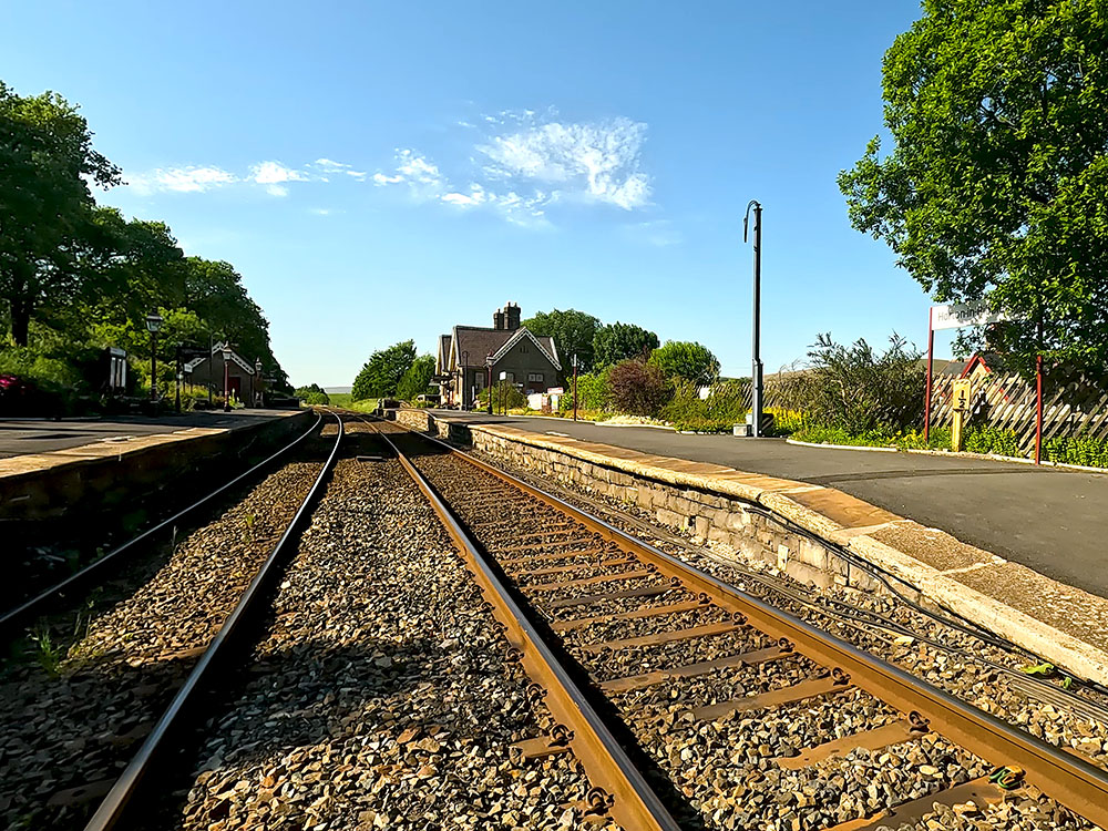 Carefully cross over the train tracks at Horton in Ribblesdale train station