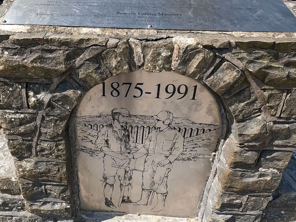 A memorial by the Settle to Carlisle railway to those who originally built it and to those who repaired it