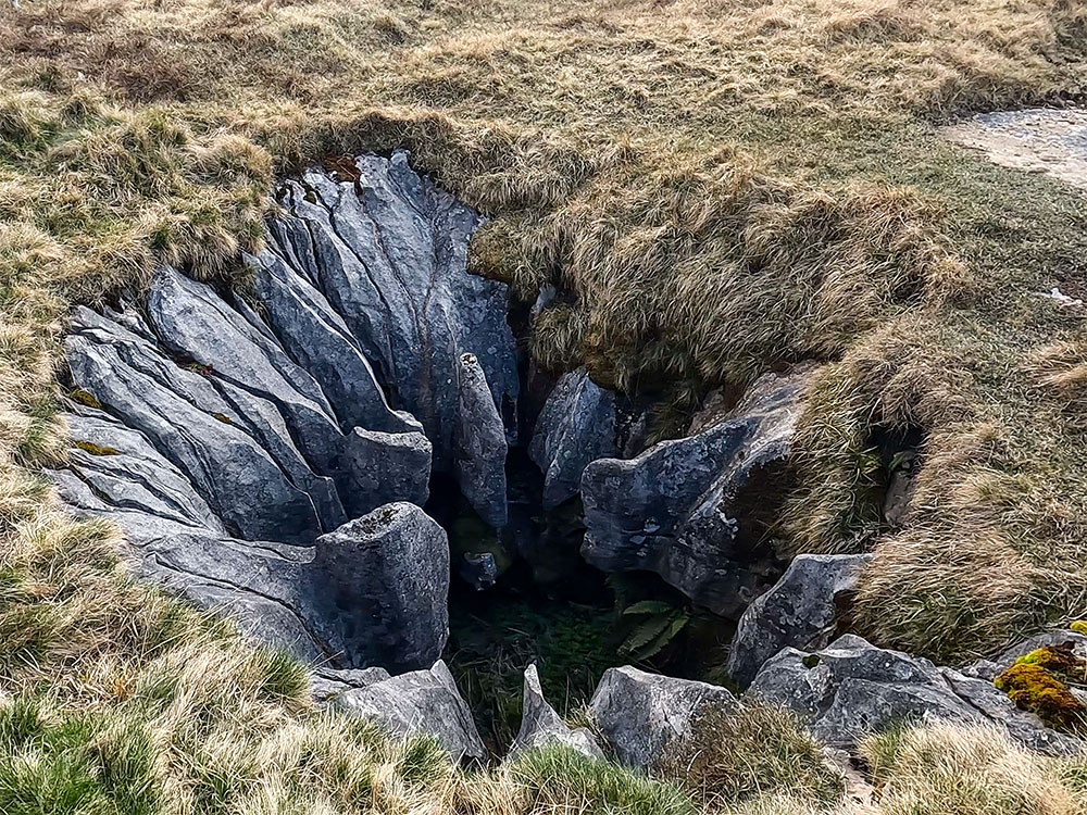 One of the strange shaped limestone potholes on Whernside