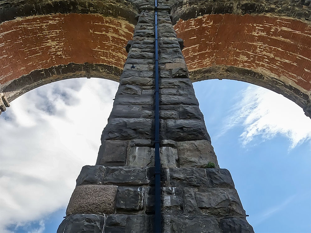 Looking up at two of the arches in the Ribblead Viaduct
